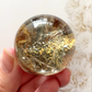 Golden rutile with garden Quartz sphere