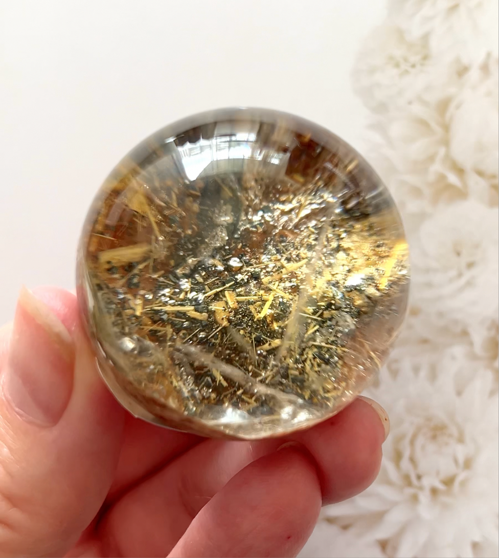 Golden rutile with garden Quartz sphere