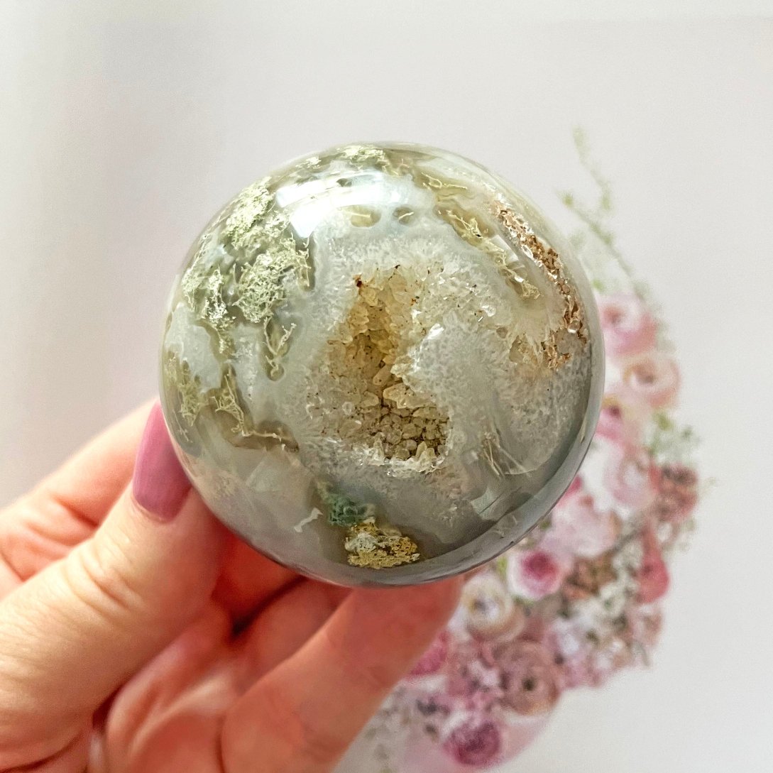 Moss agate sphere with druzy