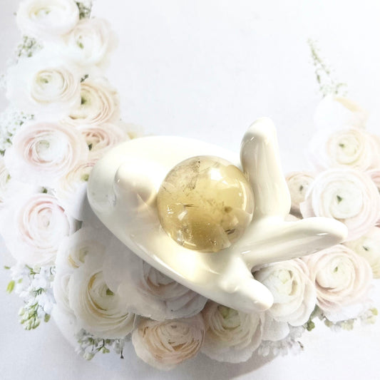 Natural citrine sphere with rainbows for decor