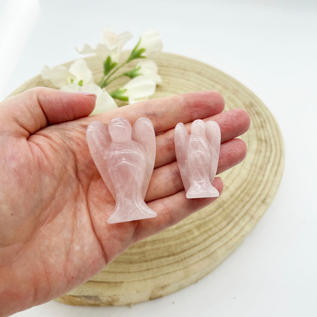 rose quartz angels polished and carved stone