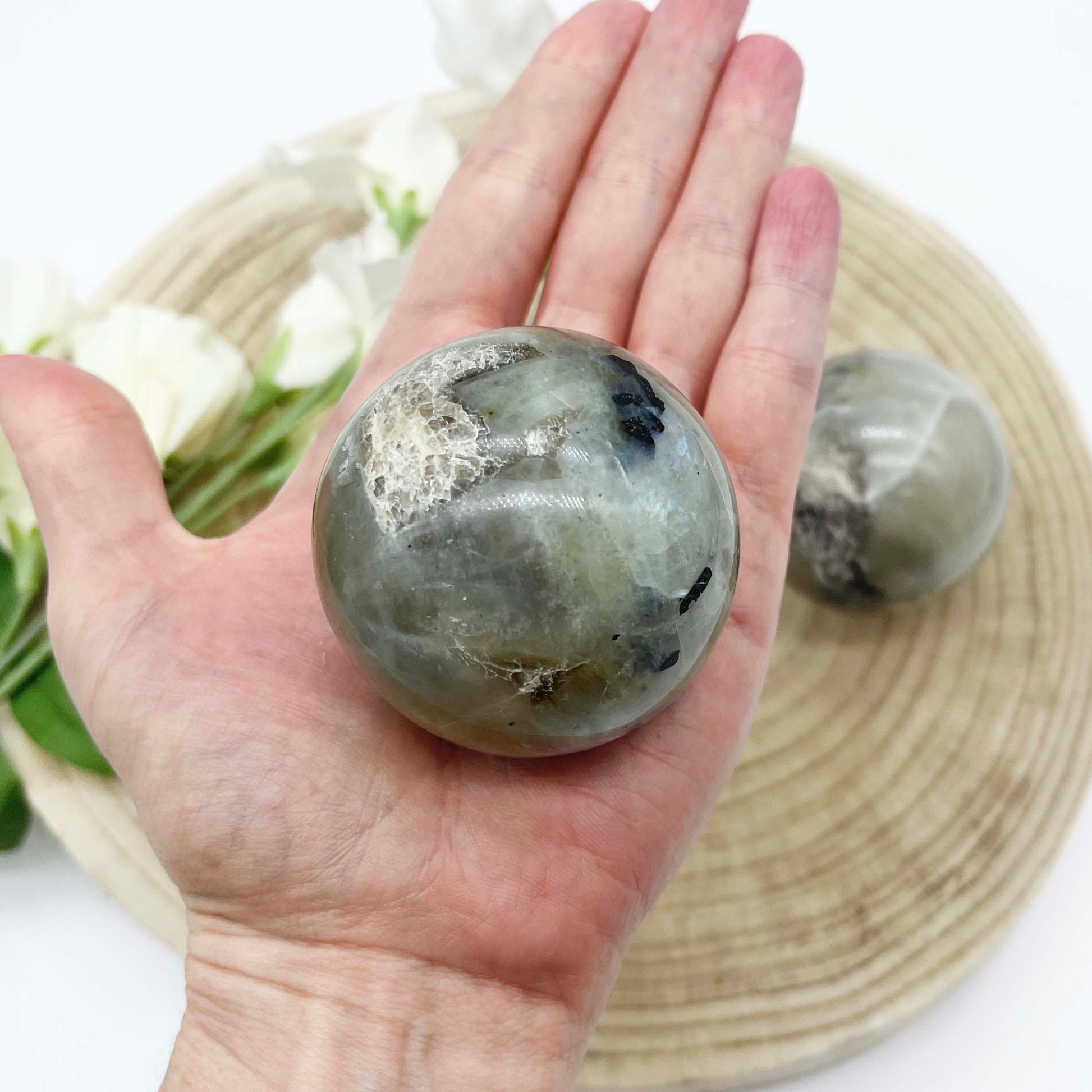 green moonstone garnierite sphere. polished natural stone