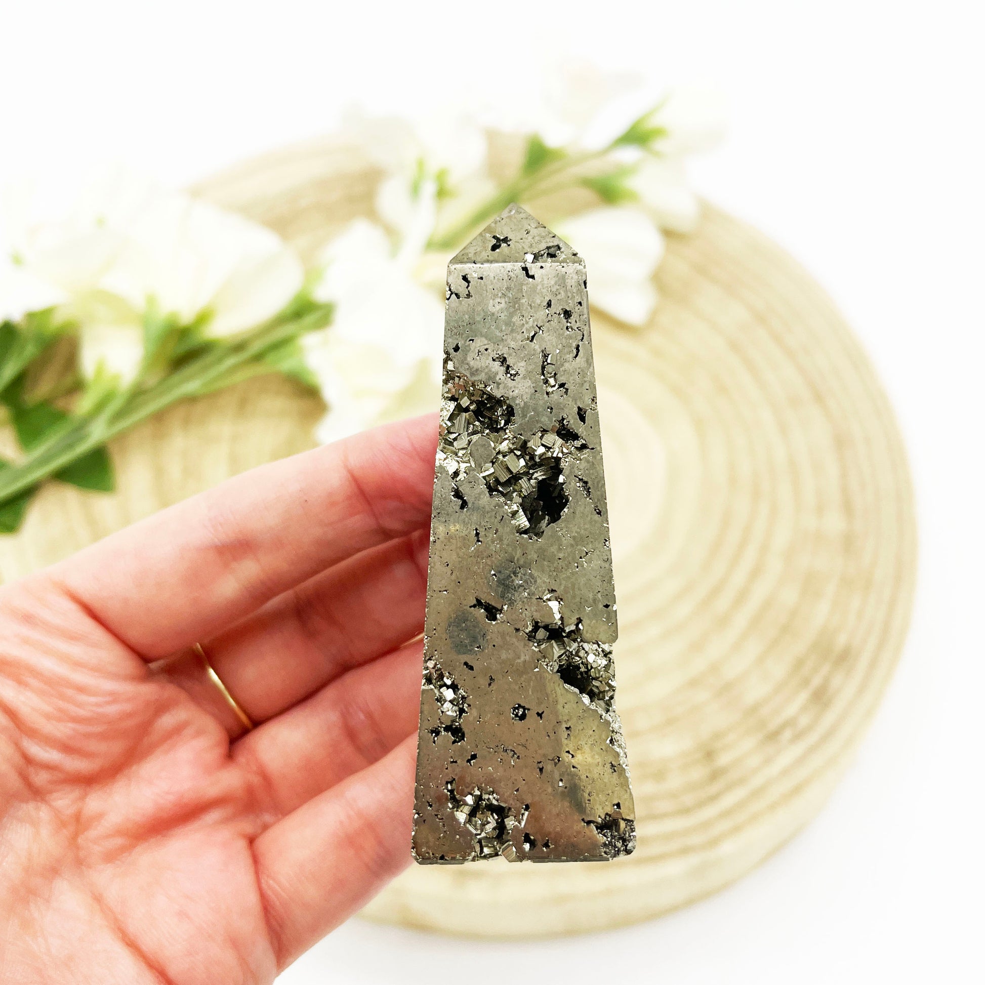 Pyrite crystal obelisk with exposed druzy