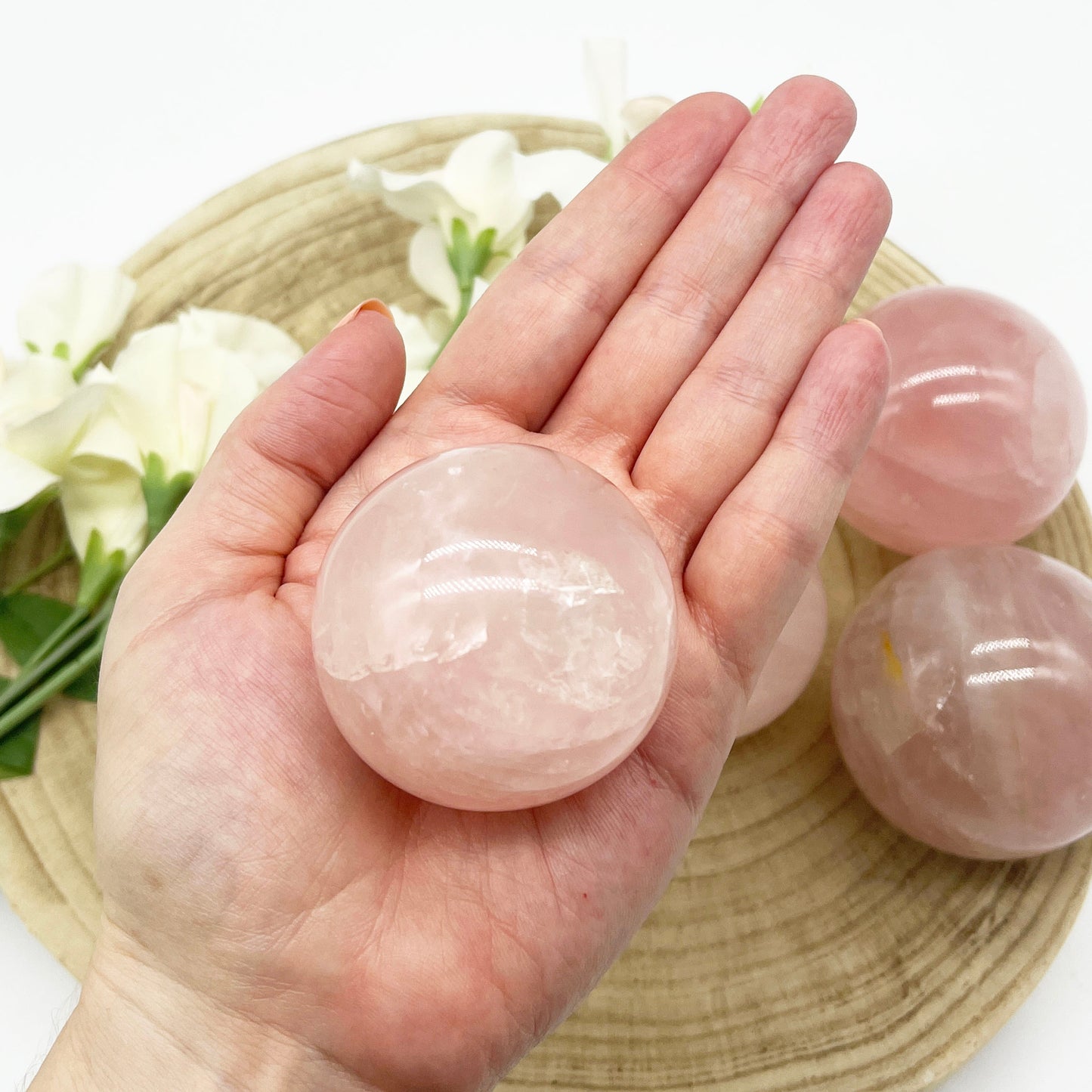 Rose quartz crystal sphere